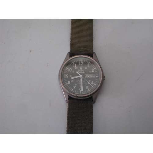 123B - A Dutch Military Day Date Wristwatch, running