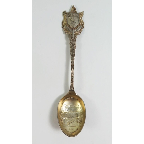 146 - A Gilt and Enamel Teaspoon and one other depicting South Africa's parliament and Table mountain