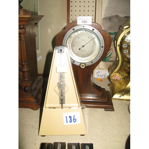 186 - A J.W. Wray & Co.  Barometer and metronome