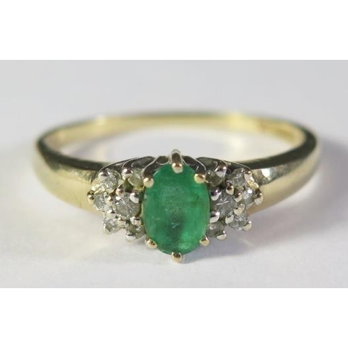 2 - A 9ct Gold, Emerald and Diamond Ring, size S.5, 2.5g. Bought from Conroy Couch of Torquay receipt fr... 