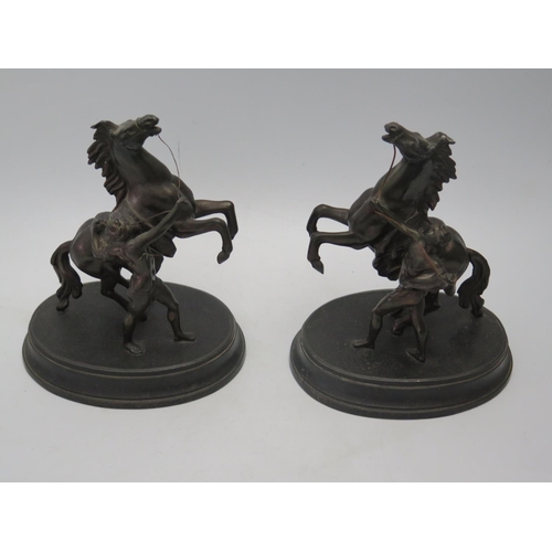 425a - A Pair of Spelter Marly Horses