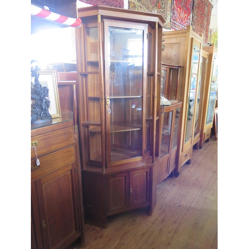 452 - A Viennese Secessionist Mahogany and Inlaid Corner Cabinet, glazed display cabinet and one other