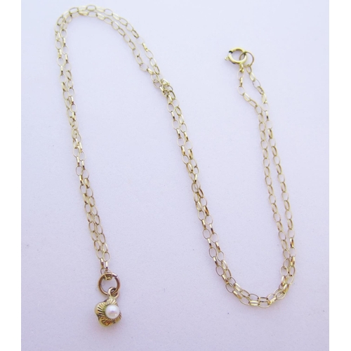 62 - A Pearl Pendant with 9ct gold necklace, .9g