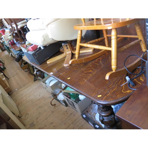 621 - A Victorian Carved Oak Dining Table