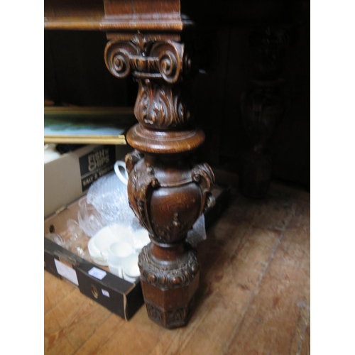 621 - A Victorian Carved Oak Dining Table