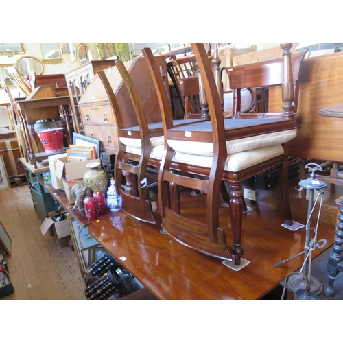 627 - A Regency Mahogany Tilt Top Pedestal Breakfast Table with four Victorian chairs