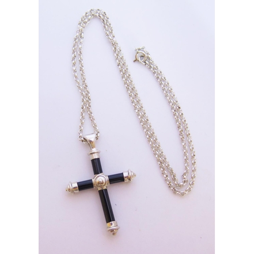 71 - A Silver Cross Pendant on chain