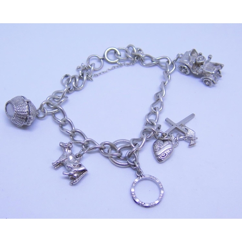 75 - A Silver Charm Bracelet, 30g