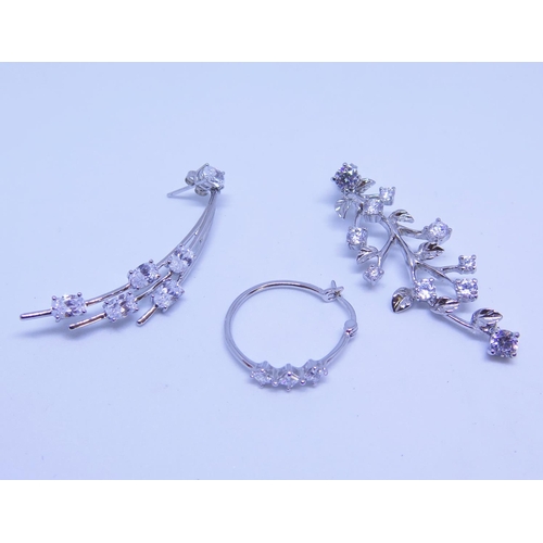 77 - A Pair of Silver Earrings and one other