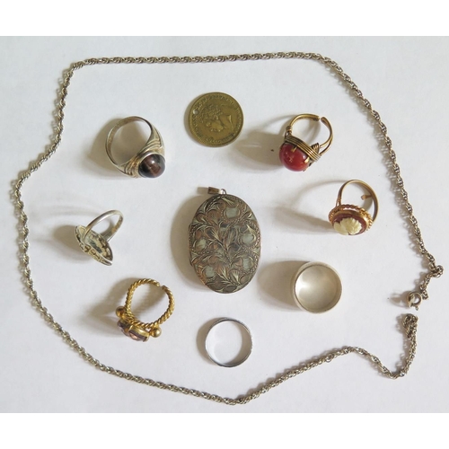 1000 - A Silver Locket, silver and costume rings etc.  **WITHDRAWN**