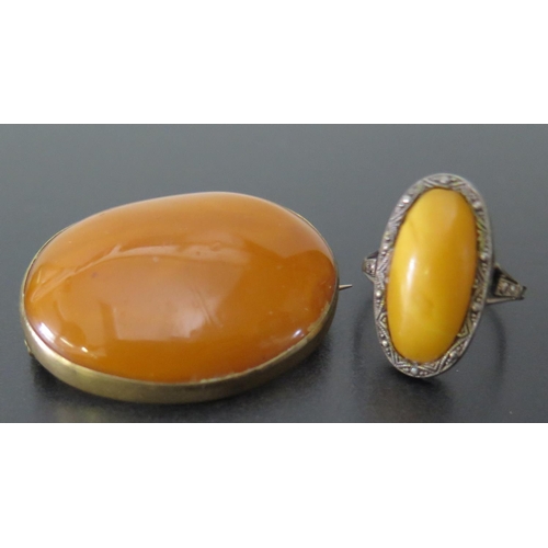 641 - An Amber Brooch 36x26mm and ring