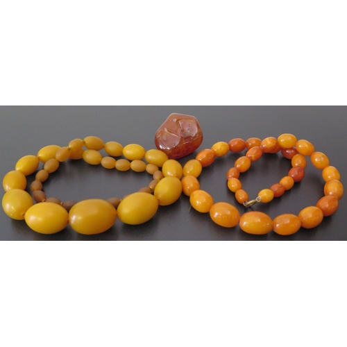 643 - A Baltic Amber Bead Necklace (largest bead18x13mm) 24g, faux amber bead necklace42g and agate specim... 