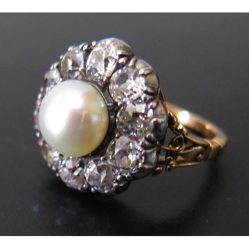 661 - An Old Cut Diamond and Pearl Cluster Ring in a high carat precious yellow metal setting, EDW 2.4ct, ... 