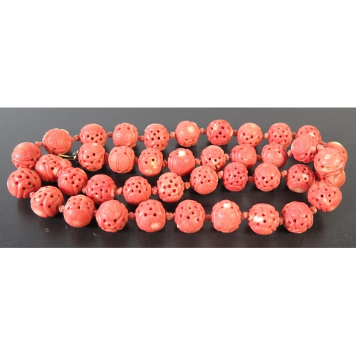 666 - A Chinese Carved Coral Bead Necklace, 9mm, 44cm, 36.9g 2xphone bids