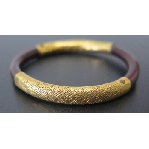 669 - A Chinese High Carat Gold Mounted Bangle, stamped marks, 48mm diam., 5.2g