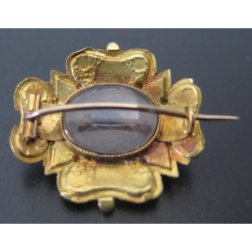 672 - A Georgian Regard Brooch in a high carat gold setting and with hair memorial verso, 25x25mm, 3.8g (P... 