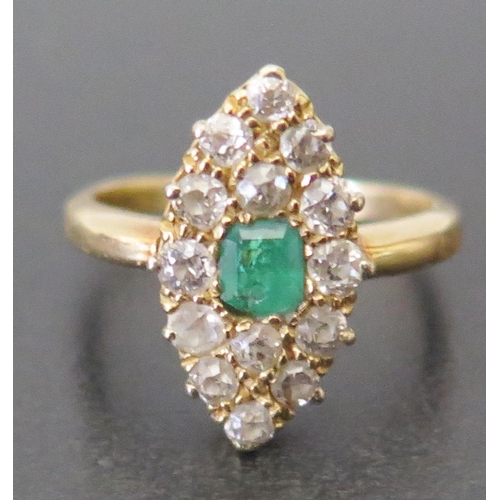 675 - An 18ct Gold Emerald and Diamond Marquis Ring, size I.5, 3.2g