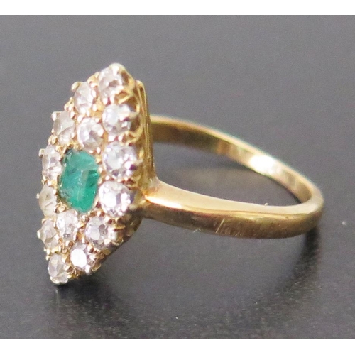 675 - An 18ct Gold Emerald and Diamond Marquis Ring, size I.5, 3.2g