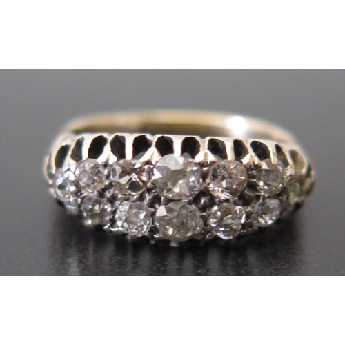 678 - An Old Cut Diamond Double Row Ring in a high carat gold mount, size P.5, 3.7g and in contemporary le... 