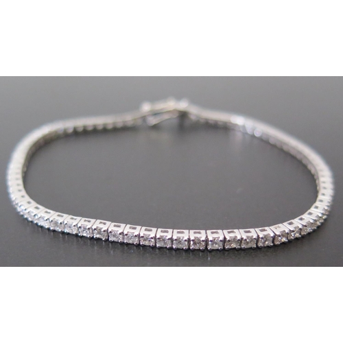 682 - An 18ct White Gold and Diamond Line Bracelet, 2.8ct, 18cm, 8.3g, Bowden & Sons of Plymouth box