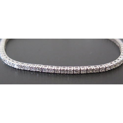 682 - An 18ct White Gold and Diamond Line Bracelet, 2.8ct, 18cm, 8.3g, Bowden & Sons of Plymouth box