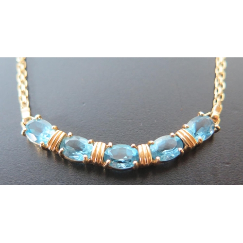 686 - A Modern 14K Gold and Blue Topaz necklace, 6g, clasp damaged