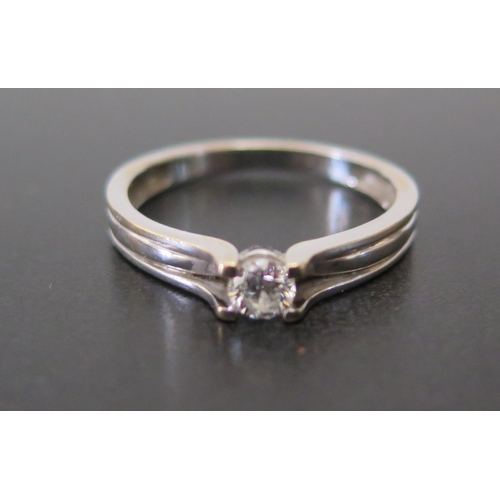 689 - An 18ct White Gold .2ct Diamond Solitaire, size O, 2.8g