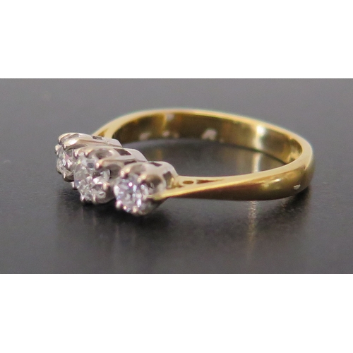 690 - An 18ct Yellow Gold Three Stone Diamond Ring, size J.5, 3.3g