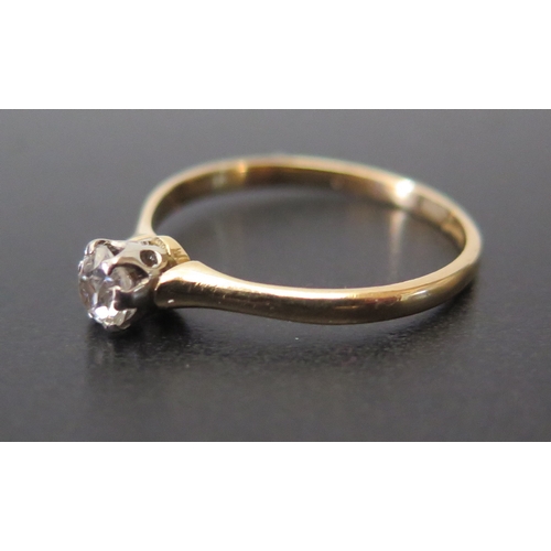 692 - A Diamond Solitaire in a high carat gold setting, marks rubbed, P.5, 2g