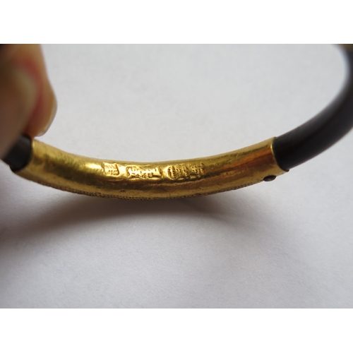 669 - A Chinese High Carat Gold Mounted Bangle, stamped marks, 48mm diam., 5.2g