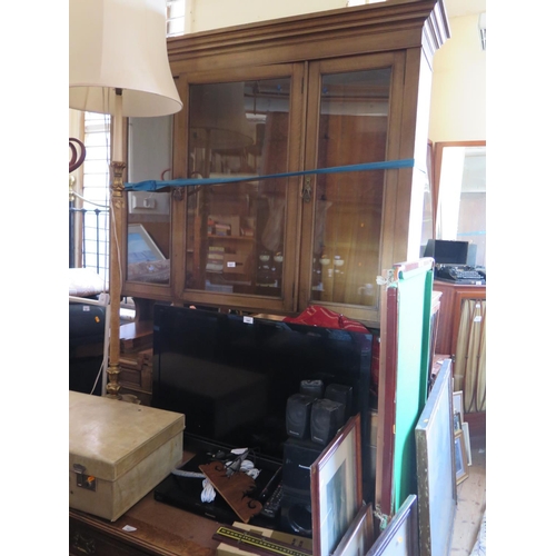 693 - An Imposing Victorian Glazed Bookcase with cupboards and drawers below