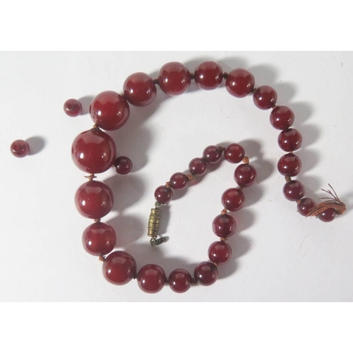 42D - A Faux Amber Bead Necklace, 30.7g, largest bead 18mm

***PHONE BID***