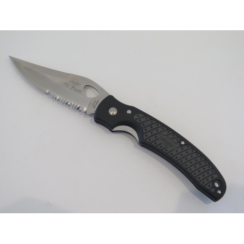 113 - A Junglee Tri-Point Semi Serrated Lock Knife