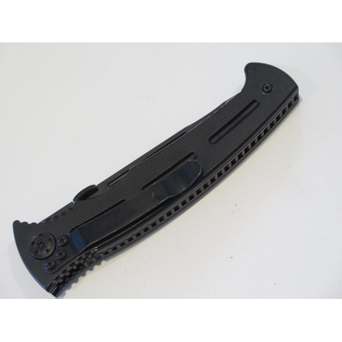 228 - A Masters of Defense Ayoob RazorBack Semi Serrated Edge Tactical Knife