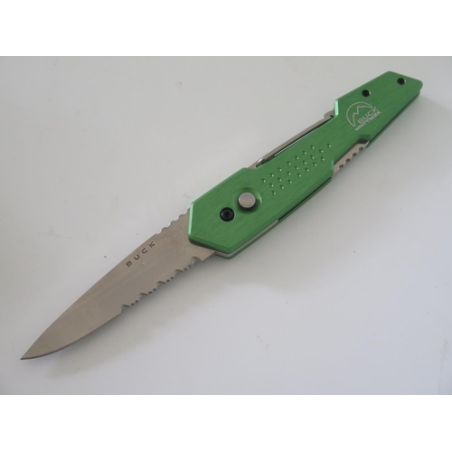 243 - A Buck Revolution-XT Green Sahara Knife