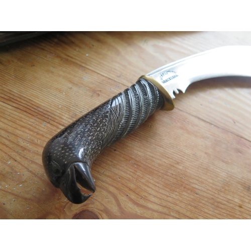 309 - A Modern Kukri with bird of prey pommel, 17