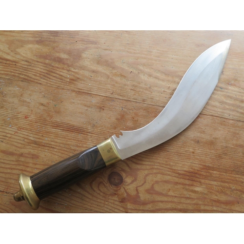 311 - A Modern Kukri, blade stamped Solingen Pakistan, 17.75