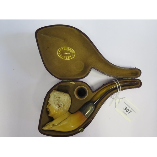 275A - A Peterson's Patent Meerschaum Pipe decorated with the bust of a moustached man: COMICAL CHRIS (an E... 