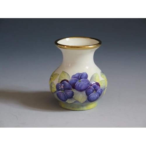 113 - A Modern Moorcroft Enamel Blue Floral Vase, 5cm, dated 98 and initialled D.J.H, boxed