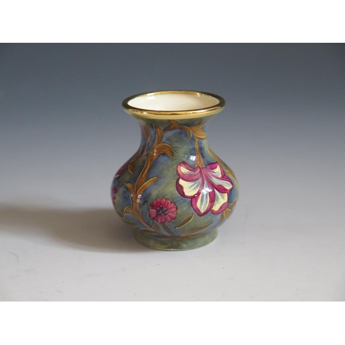 114 - A Modern Moorcroft Enamel Purple Floral Vase, 5cm, dated 98 and initialled C.B, boxed