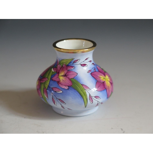 118 - A Modern Moorcroft Enamel Purple Floral Vase, 5cm, dated 98 and initialled MCC 99