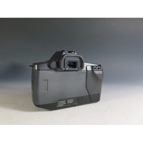 301 - A Canon EOS 600 35mm SLR Camera Body (boxed with manual), Sekonic Digilite F model L-328 (boxed) and... 