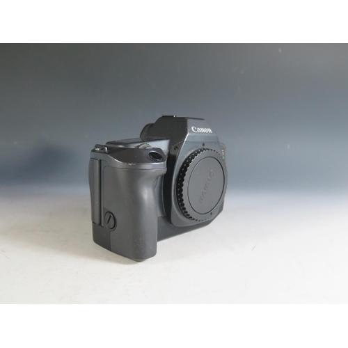 301 - A Canon EOS 600 35mm SLR Camera Body (boxed with manual), Sekonic Digilite F model L-328 (boxed) and... 