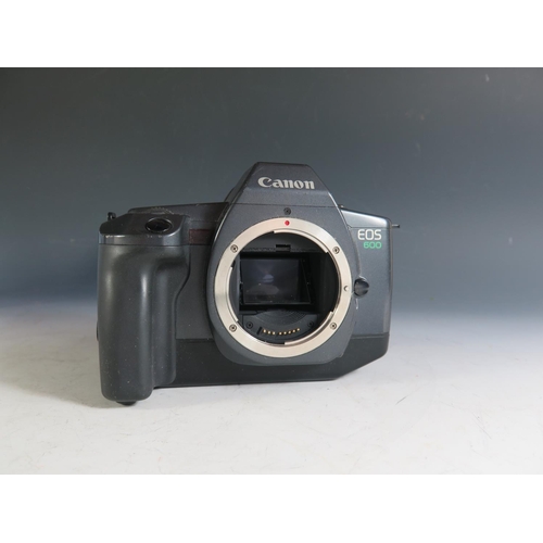 301 - A Canon EOS 600 35mm SLR Camera Body (boxed with manual), Sekonic Digilite F model L-328 (boxed) and... 