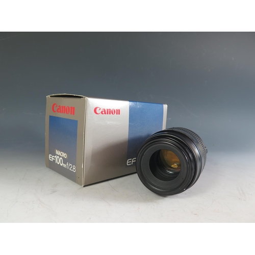 303 - A Canon MACRO EF100mm f/2.8 Lense. Appears in excellent condition