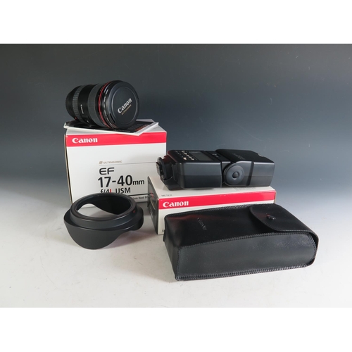 304 - A Canon EF17-40mm f/4L USM Lense (boxed with manual) and Speedlite 540EZ. Appears in excellent condi... 