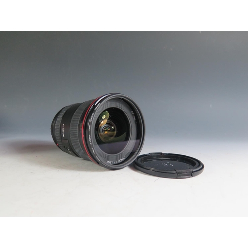 304 - A Canon EF17-40mm f/4L USM Lense (boxed with manual) and Speedlite 540EZ. Appears in excellent condi... 