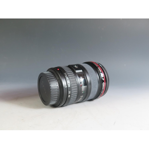 304 - A Canon EF17-40mm f/4L USM Lense (boxed with manual) and Speedlite 540EZ. Appears in excellent condi... 