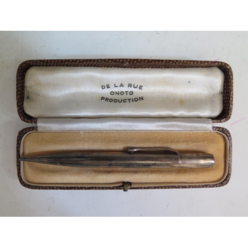 308 - A De La Rue Onoto Silver Propelling Pencil in case