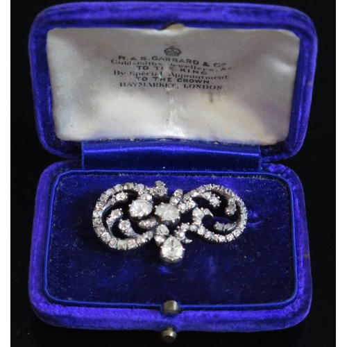 586 - A Georgian Diamond Brooch in a fitted R. & S. Garrard & Co. plush box. The precious yellow and white... 